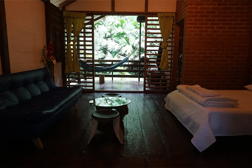 Private bedroom with jungle view at an ayahuasca retreat in Colombia