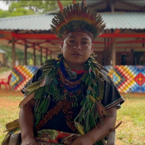 Taita Miguel of the Camsá tribe wearing traditional ceremonial attire at an ayahuasca retreat in Colombia.