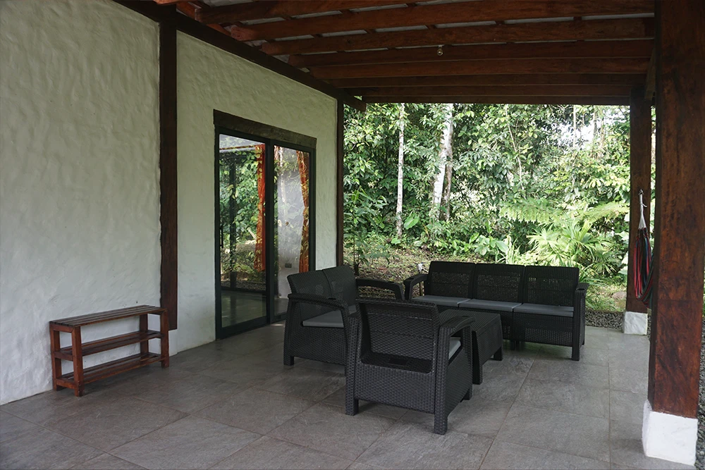 Private jungle cabin bathroom with natural light at Mahadevi Ayahuasca Retreat