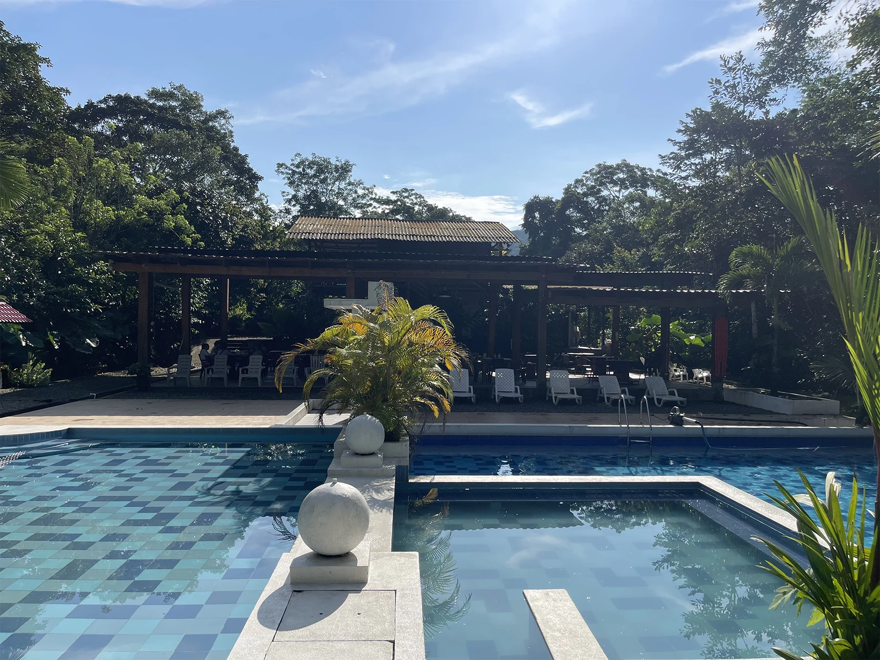 Swimming pool with jungle surroundings at MahaDevi luxury ayahuasca retreat venue Putumayo Colombia
