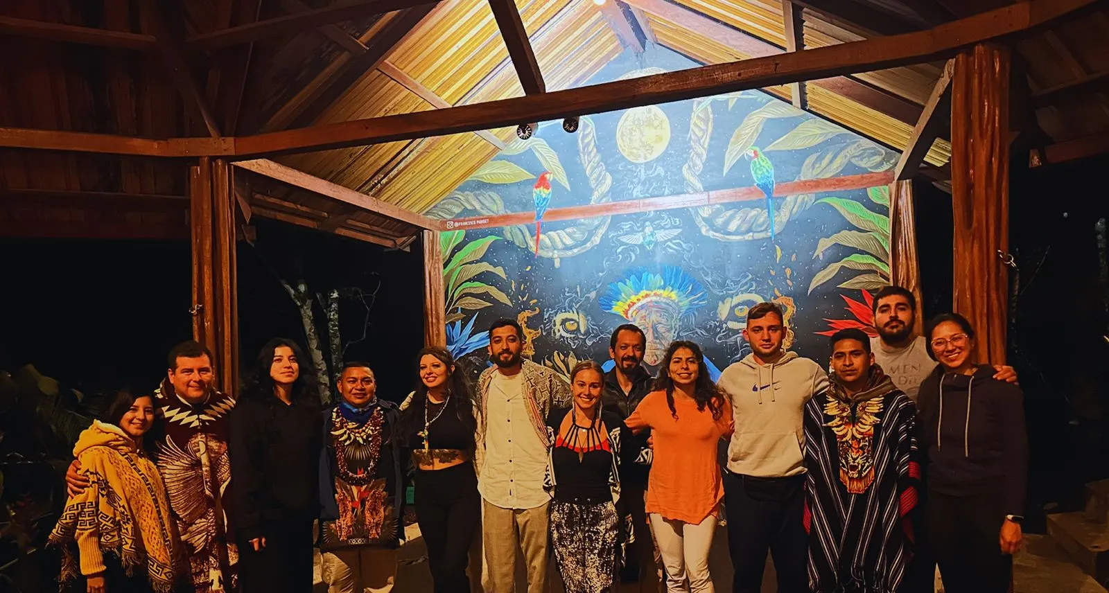 Team and facilitators gathered inside the Mahadevi Maloka ceremony space at MahaDevi Ayahuasca Retreat in Colombia